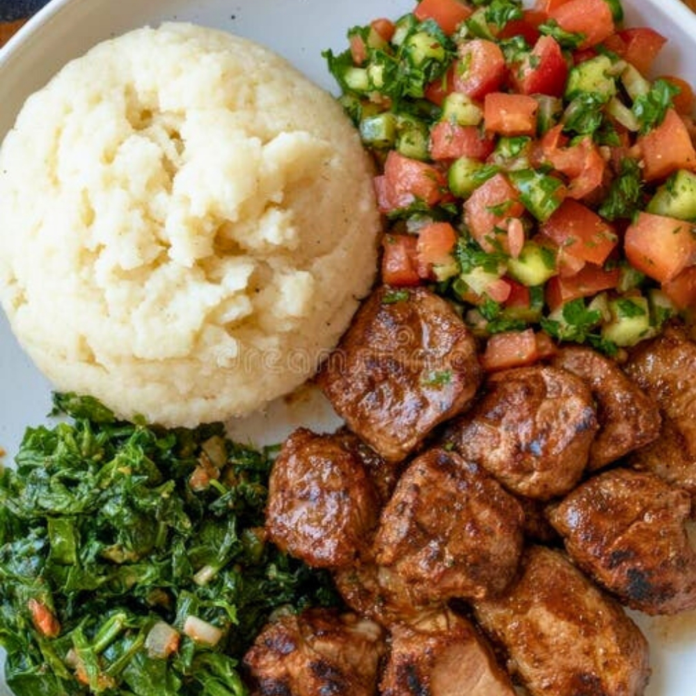 nyama choma, ugali, and greens nyama choma, ugali, and greens